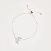 A product shot of 'Adjustable Silver Moon Bracelet' Designer Mother of Pearl Jewellery by Freya Rose London