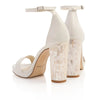 Product image of the back view of 'Dove' by Freya Rose London - An ivory leather bridal shoe with pearl heel