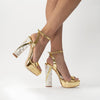 Woman Wearing Tyra Gold Platform Pearl Heels | Freya Rose