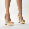 Woman Wearing Tyra Gold Platform Pearl Heels | Freya Rose