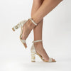 A model wearing Rozu - Pearl Heel - Freya Rose Pearl Shoes and Jewellery