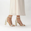 A model wearing Rozu - Pearl Heel - Freya Rose Pearl Shoes and Jewellery