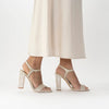 Side view of a model wearing 'Martina' Designer bridal shoes with pearl heels - Freya Rose London