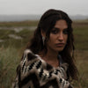 A model wearing 'Hakuro Silver Midi' A sterling silver mother of pearl and seed pearl drop earring - Freya Rose Jewellery
