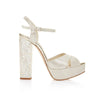 A side shot of 'Bonnie' a Freya Rose Ivory Suede Bridal Shoe with pearl heels