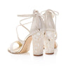 A product shot of 'Flora' - Ivory Shimmering Suede & Champagne Mirrored Leather Sandal Bridal Shoes by Freya Rose London