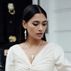 Large Baroque Pearl Drop Earrings shown on a model by Freya Rose London