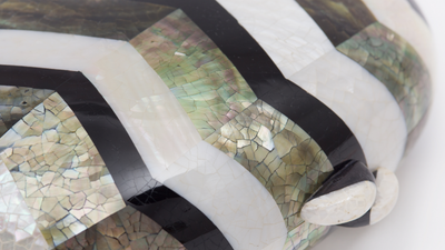 Introducing Calypso: Pearl Clutch with a touch of drama