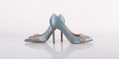 A pair of Freya Rose Embellished Wedding shoes heel to heel on a white background.
