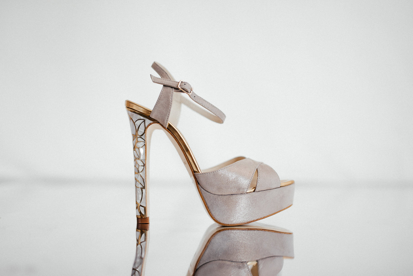 A gold and white floral design Freya Rose Couture  Shoe