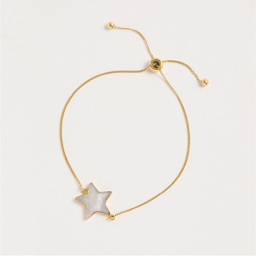 A product shot of 'Adjustable Star Bracelet Gold' Designer Mother of Pearl Jewellery by Freya Rose London