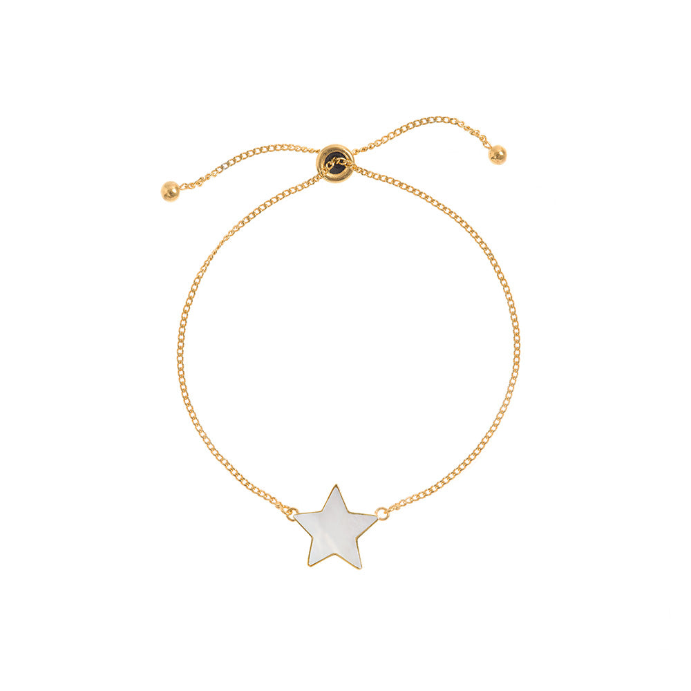 A product shot of 'Adjustable Star Bracelet Gold' Designer Mother of Pearl Jewellery by Freya Rose London