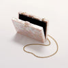 Product image of 'Athena Pink' by Freya Rose London shown open with chain - A pink toned Mother of Pearl designer clutch