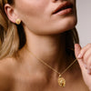 Lion pendant i and studs n 18ct gold vermeil on sterling silver with textured lion design symbolising strength.