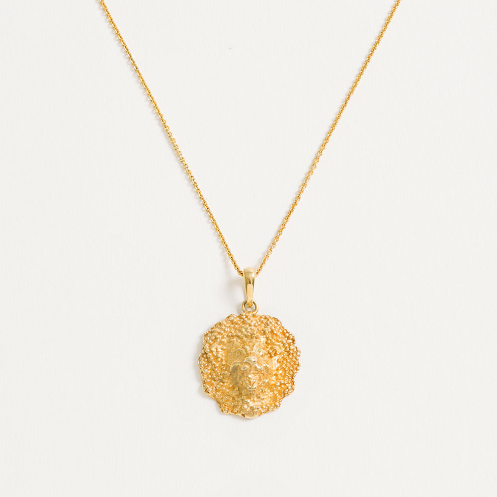 Lion necklace in 18ct gold vermeil with detailed textured mane design on sterling silver chain.
