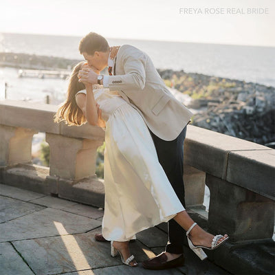 Freya Rose Real Bride wearing pearl and crystal embellished champagne designer wedding shoes with pearl heels 