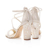 A product shot of 'Flora' - Ivory Shimmering Suede & Champagne Mirrored Leather Sandal Bridal Shoes by Freya Rose London 
