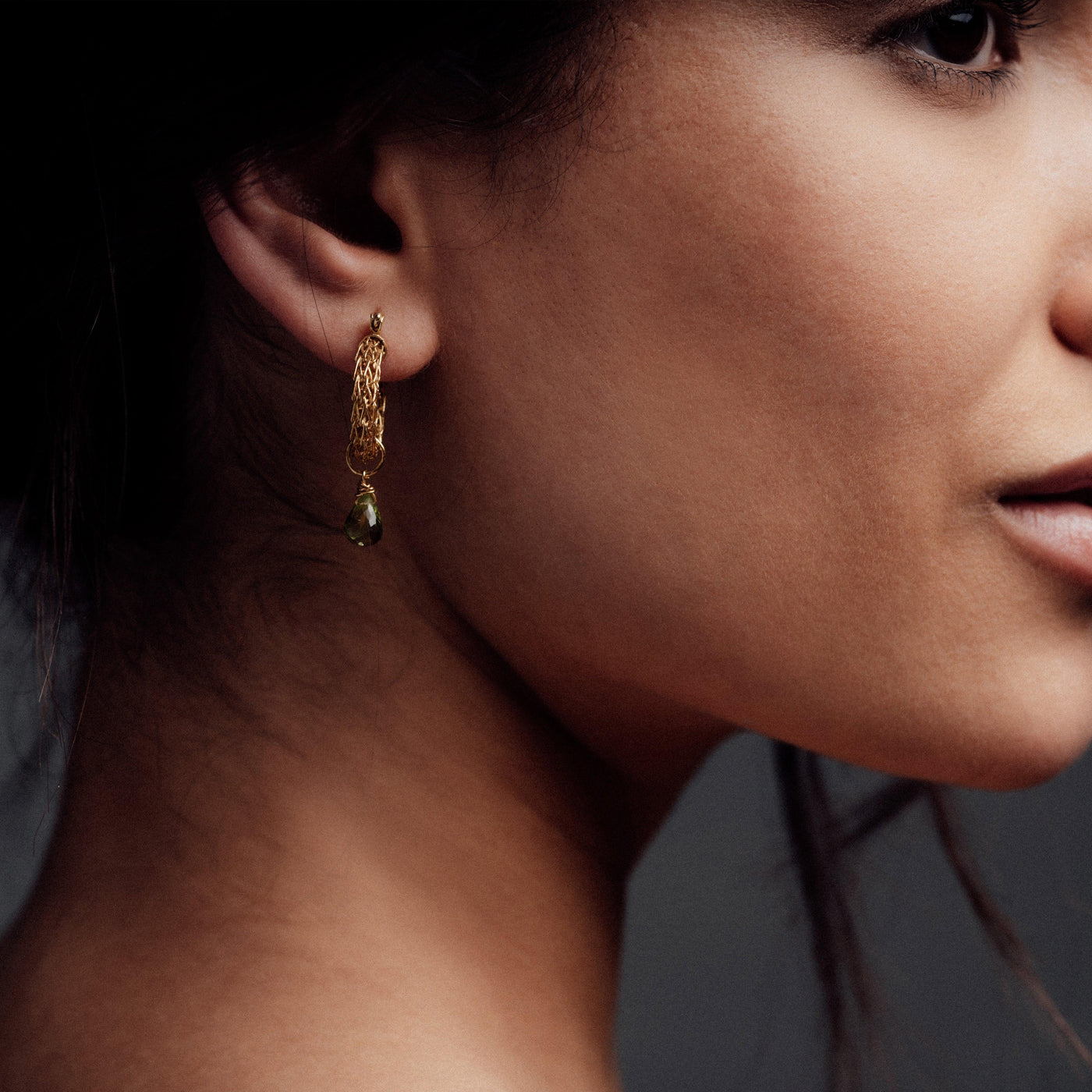 Gold Weave Mini Hoop Earrings with Peridot Charm shown on a model - Freya Rose Jewellery