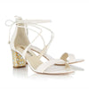 A pair of Freya Rose Ivory Leather Bridal Shoes